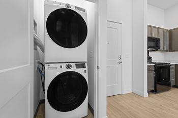 Front loading washing machine in a laundry room